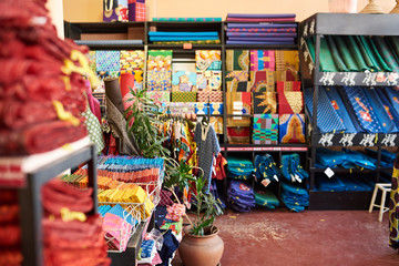 Assorted colorful textiles on display in a fabric shop