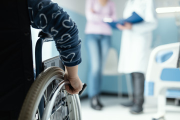 Girl in wheelchair at the hospital