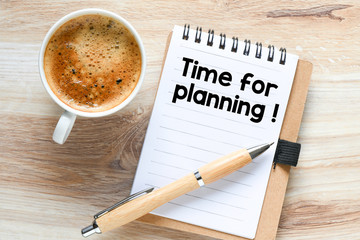 Time for planning text on notepad - business concept