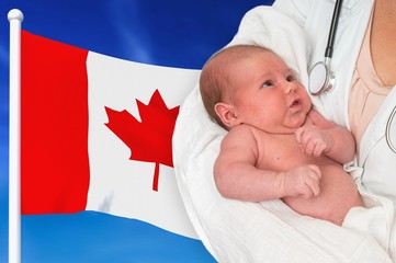 Birth rate in Canada. Newborn baby in hands of doctor.