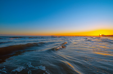 On the Baltic Sea in the winter month of January. Sunrise near the 'Seebrücke' (pier) at the German town of Ahlbeck.
