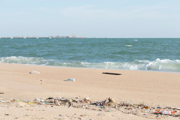 Plastic waste from the sea on the beach Caused by human actions And is a global problem