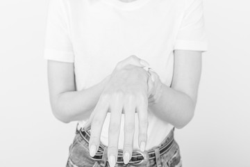 Elderly woman suffering from pain, weakness and tingling in wrist. Causes of hurt include...