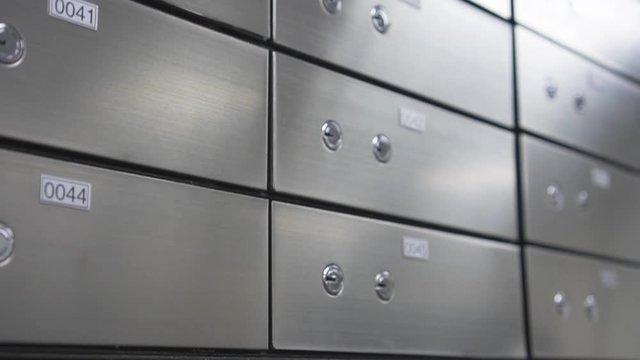 Moving shot Metal safe box panel wall. Concept for security and banking protection.