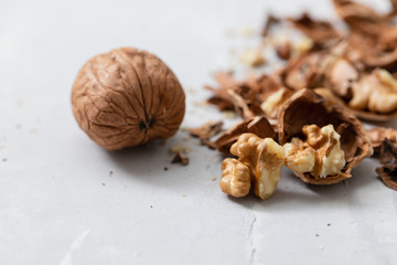 fresh dry walnut on ceramic background