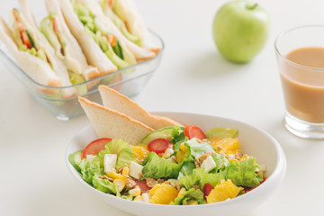 Healthy vegetarian sandwiches. Variety toasts stack on glass container over white background