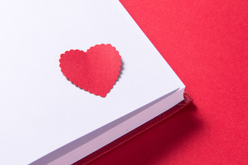 Note book on red background