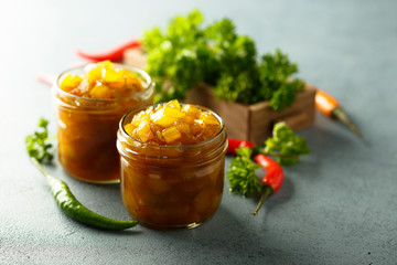 Homemade fruit chutney with pepper and herbs