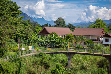 Fototapeta na wymiar Village and mountain in Vang Vieng, Laos Southeast Asia.