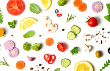 Various fresh vegetables, spices and herbs on white background. Healthy eating concept. Food pattern with raw ingredients of salad. Flat lay, top view. 