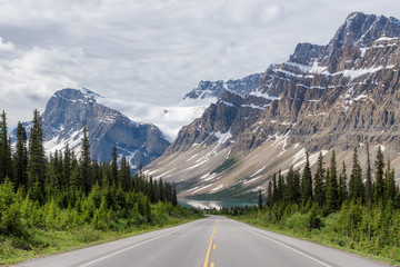 Mountains highway road trip. Icefields Parkway at Crowfoot Glacier and Bow Lake in Banff National...