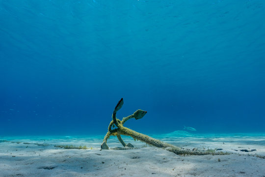 Old anchor in bottom of the sea near Lipsoi island Greece