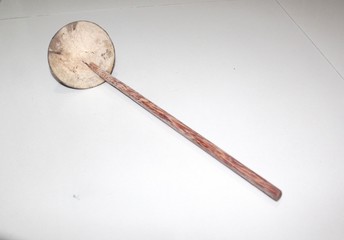 wooden spoon for cooking vegetables isolated on white background