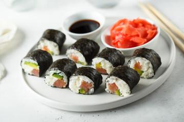 Homemade maki sushi with salmon