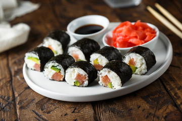 Homemade maki sushi with salmon