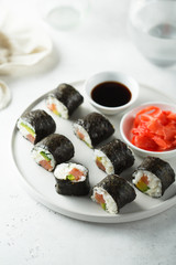 Homemade maki sushi with salmon