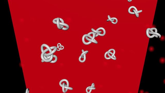 Flying metallic knotes on red and black background, blurry red lights. Node as a symbol of a problem or mystery. 3D particle animation full HD resolution
