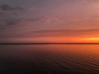 Red orange fire sunset at the sea