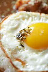 Fried egg with seasoning on rice 