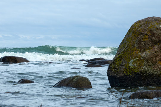 Waves floating on rocks at Kap Arkone