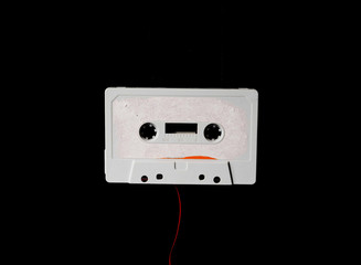 Leeds, UK, 03/02/19Cassette unspooled with loose tape tangled up around itself shot on isolated on...