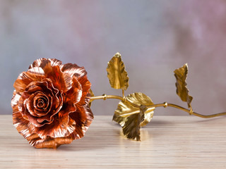unfading copper rose as symbol of everlasting love