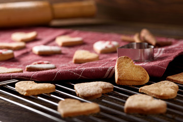 cookies hearts on burgundy cloth napkin on metal grate
