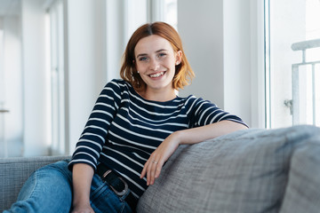 Happy friendly trendy young woman
