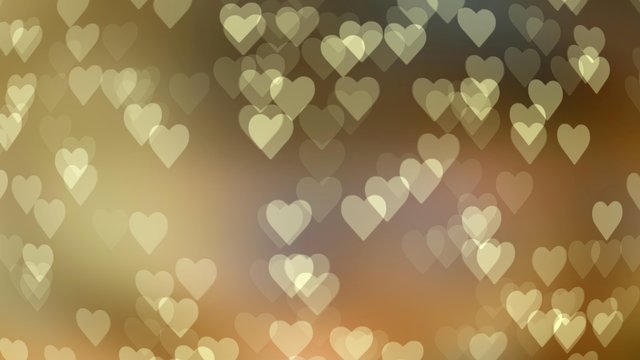 Abstract bokeh in the shape of a heart on a colored background