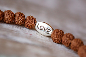 natural mineral stone beads yoga bracelet on natural wooden background