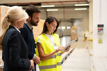 Managers checking the list of products