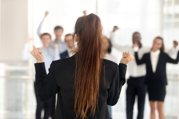 Successful female team leader make speech unify motivate colleagues