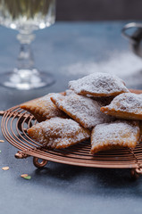 Bugie or ravioli filled with chocolate cream, typical carnival italian fritters.