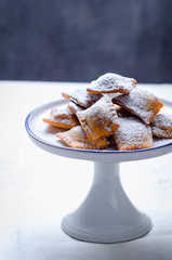 Bugie or ravioli filled with chocolate cream, typical carnival italian fritters.