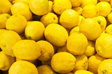 Top view on yellow lemons. Vitamin healthy foods. Fruit background