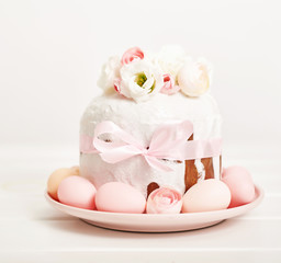 Easter orthodox sweet bread, kulich and colorful eggs with flowers. Holidays breakfast concept with copy space. Retro style. Easter greeting card template