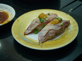 Sushi on plate in restaurant Japan