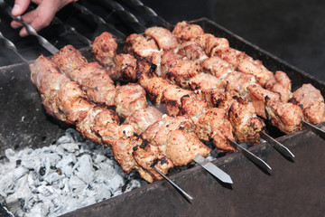 Cooking kebabs in the rain