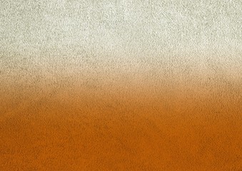 Texture of genuine leather. Suede leather texture closeup. Gray and orange background.