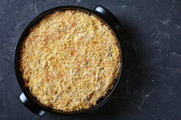 roasted turkey tetrazzini in a black dish