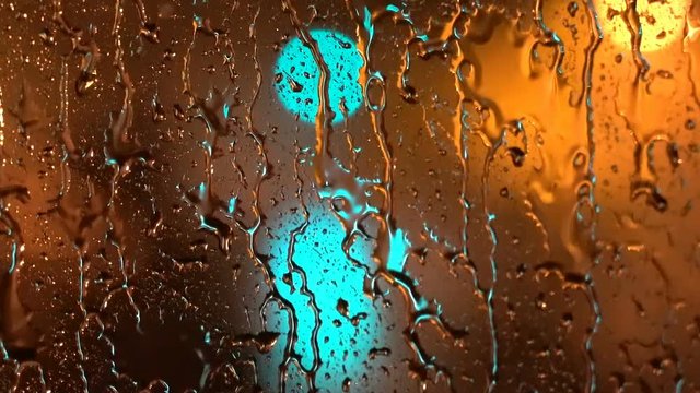 Melancholy Rain - City Through Rainy Window at Night