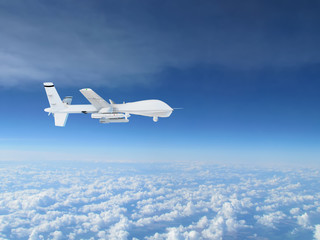 military UAV airplane flies against backdrop of beautiful clouds on blue sky background