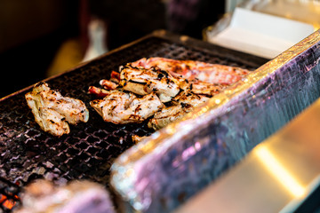 Delicious grilled crab legs street food