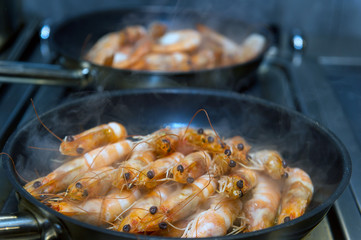 cooking shrimp cocktail with sauce in a restaurant, ready meal