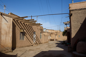  Traditional mud homes in ancient walled city of Itchan Kala in Khiva, Uzbekistan