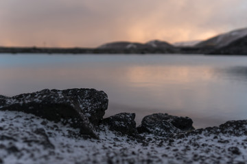 sunset on coast of sea