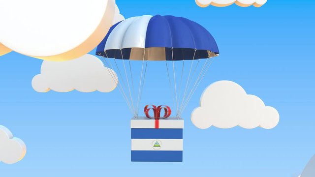 Box with national flag of Nicaragua falls with a parachute. Loopable conceptual 3D animation
