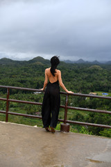 tourists admire the natural beauty of the chocolate hills on bohol island in the philippines