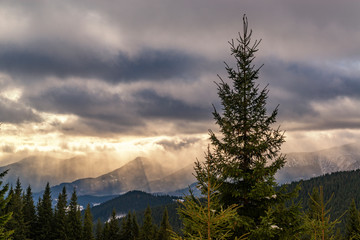 Dramatic sunset high in the winter mountains.