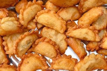 top view deep fried traditional Chinese Yau Kok Zai or sweet dumpling